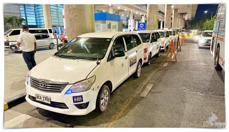 taxis blancos de aeropuerto de Manila